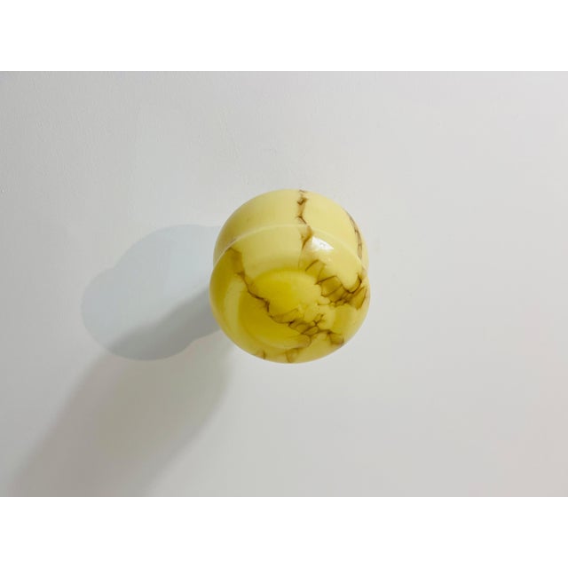 Beautiful Glass flush mount from the 1930s, made in Germany. The soft, diffused light passing through the veined glass...