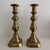 This is a pair of vintage solid brass candlesticks, standing at 10 inches high. Made of brass, these candle holders add a...