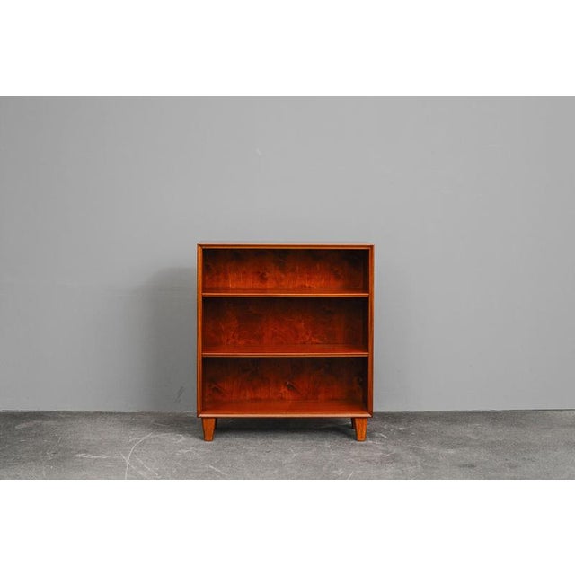 Item: Small bookcase Period & Style: Mid-Century - Mid-20th century Features: - Simple and timeless bookcase - Ideal for...