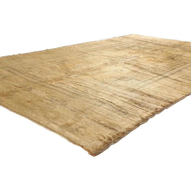 74093 Vintage Earth-Tone Turkish Oushak Rug, 07'00 x 11'05. Like parchment faded by time and sunlight, this hand-knotted...