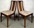 Elevate your dining space with this beautifully crafted mid-century dining chair set, complete with a stately captain’s...