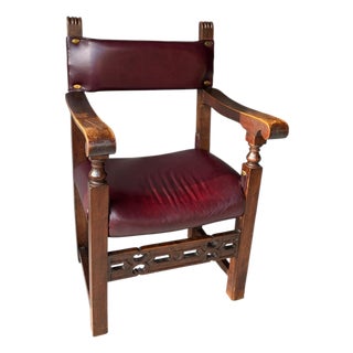 Rare Antique Spanish Revival / Gothic Oak Armchair in Oxblood Leather & Bronze Accents For Sale