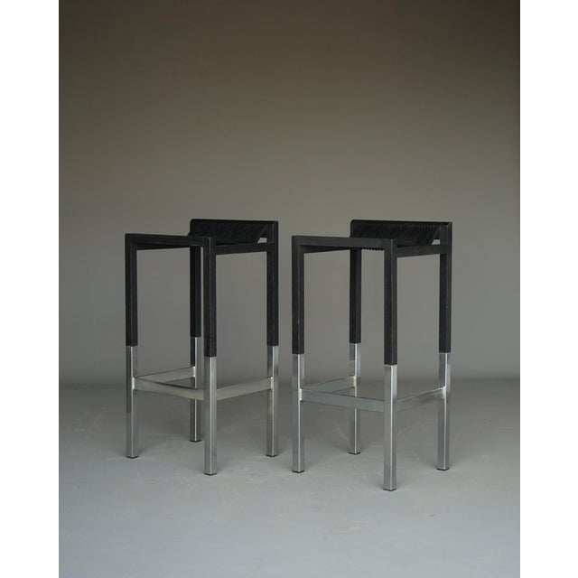 A beautifully constructed pair of simple bar stools designed by Ruud Jan Kokke in the 1980s. The seats are made of...
