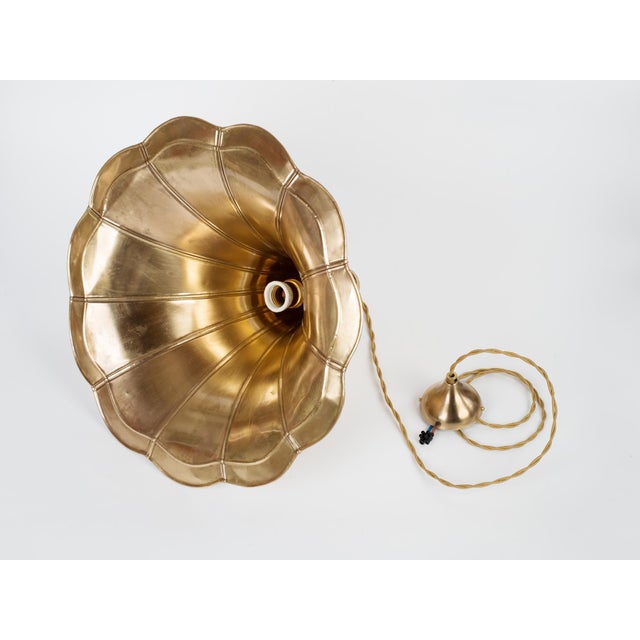 Vintage 1930s brass horn, professionally upcycled and rewired in the 21st century. Elevate your interior with this...