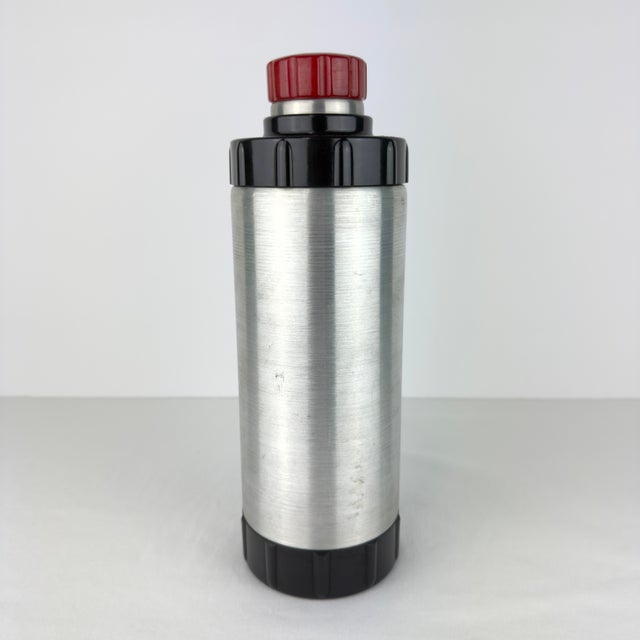 A complete early‑production Art Deco West Bend cocktail shaker set, made ca. 1934–1936 and marked with both original...