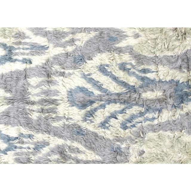 Contemporary Egyptian Tulu Rug. Hand woven in an Ikat design with wool on cotton foundation in the Nile delta region of...