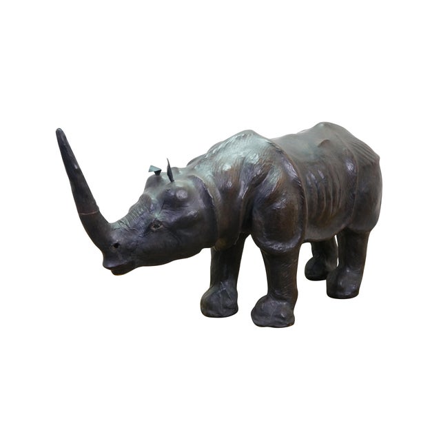 Vintage tooled leather African Rhino sculpture / foot rest / ottoman. Dimensions: 34.5" x 10" x 17.5" (W x D x H)