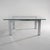 A square coffee table from the 1970s built around the combination of transparent glass and the reflective surface of...