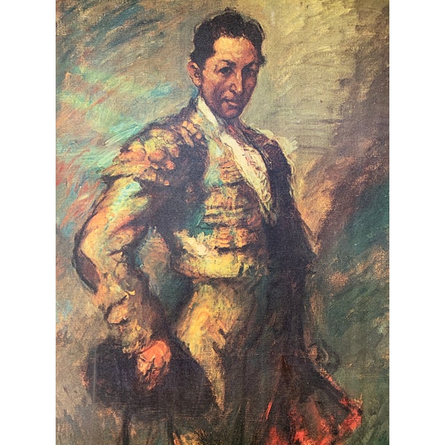 A framed mid-century print of the famous portrait of popular matador Antonio Fuentes made by Ricard Canals (1876-1931) in...