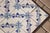 Antique 19th Century Portuguese Tiles With Floral Garland and Star Motif Set of 75 For Sale - Image 13 of 18