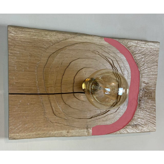 "Trottola Rosso Pompeiano" lamp by Pietro Meccani. Beautiful hand-carved oak wall lamp with colored accents. Designed in...