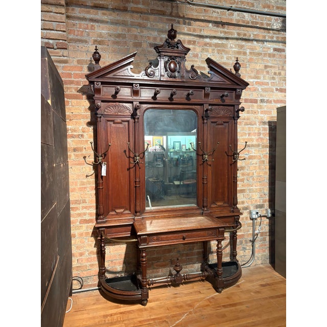 Make a lasting impression right off the bat in your home with this grand, Renaissance Revival hall tree! Perfect for...