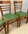 Four solid wood ladder back restaurant/diner chairs circa 1950s. Bent wood frames and intact avocado vinyl seats. Made by...