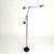 Minimalist black counterbalance floor lamp by Sölken with a double arm and two counterweights. It is super flexible,...