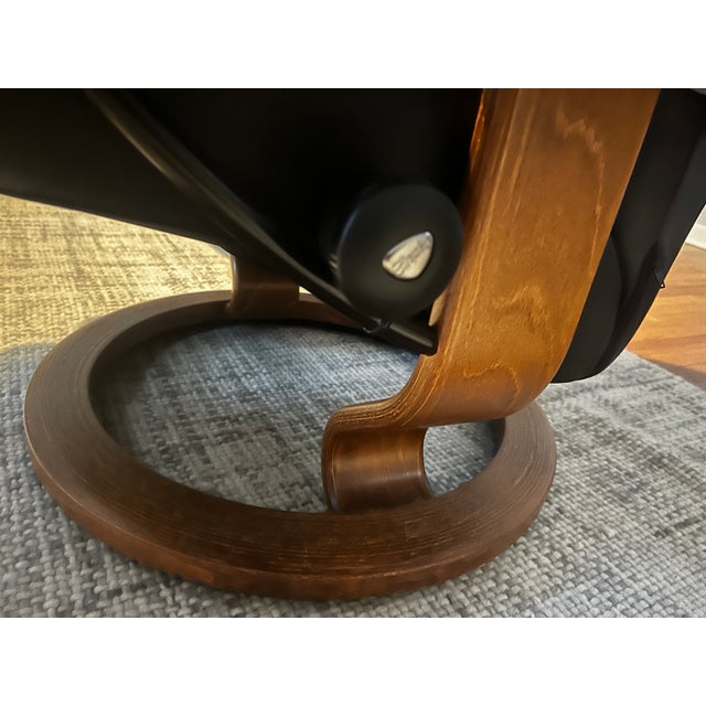 Ekornes Stressless Black Leather Recliner and Ottoman With Wood Base For Sale - Image 11 of 13