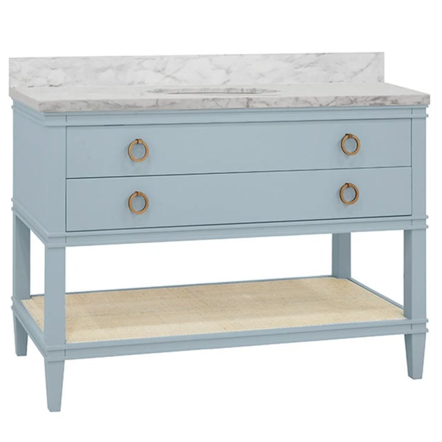 New special order item. Not vintage. Bath vanity in matte light blue lacquer with open can shelf, white marble top,...