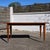 Absolutely stunning French Mid-Century Modern dining table from the 1960s. The table features a highly figured, dramatic...