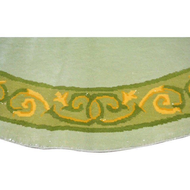 Hand-knotted with care using traditional rug-making techniques, this wool rug blends timeless craftsmanship with a modern...