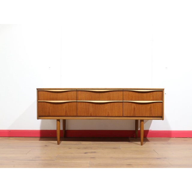 This Mid Century Modern Teak Dresser End Table By Austinsuite Danish Style is a stunning dresser that embodies timeless...
