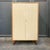 Product: wardrobe style: mid-century · 1960s material: birch veneered frame · solid wood legs · plastic coating on doors...