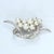 Traditional Mid 20th Century Pearl Cluster Brooch With Diamond-Encrusted Curved Bands For Sale - Image 3 of 5
