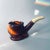 Cool little swanky number! Use it as intended or just as a display piece, this pipe has some serious tabletop presence as...