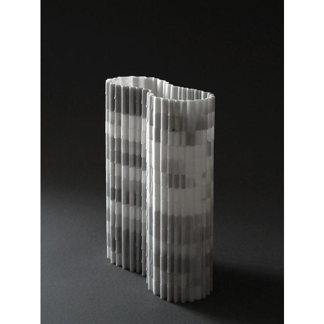 Stripes b2 decorative vase in honed striato olimpico marble by bufalini marmi dimensions: d 8 x w 20 x h 27 cm. Materials:...