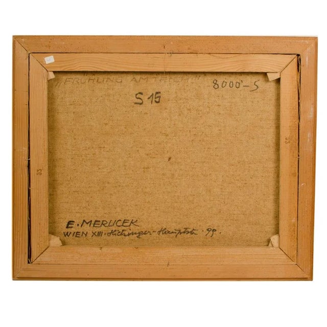 "Fruhling am Teich" (translation Spring at the Pond) depicting red trees overhanging a blue pond with several buildings in...