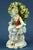 A polychrome hard-paste porcelain sculpture, entirely hand-decorated, signed under the base with a crowned "N" in blue...
