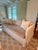 Designed to perfection, this private label sofa features a tan velvet body and a bench seat cushion in darker taupe...