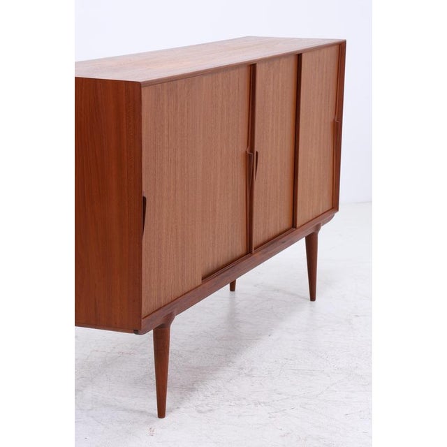 Product details beautiful vintage teak highboard by omann jun with compartments & drawers item no.: 12-57 features •...