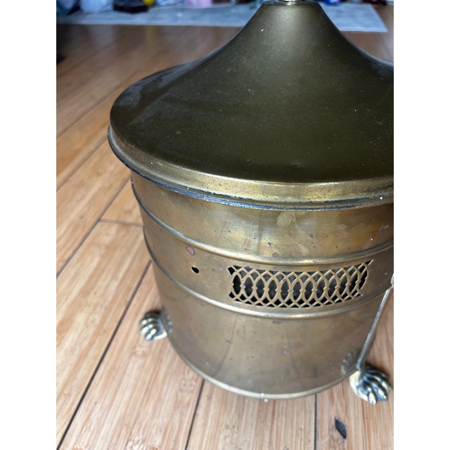 Up for consideration is a beautiful vintage brass footed coal scuttle bucket. This would look lovely in your home and it...