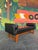 Mid Century Modern tufted even arm bench in black vinyl and walnut attributed to Selig circa 1960’s. Comes with two...