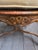 VIntage carved and caned French fauteuil chair with padded arms and a loose seat cushion. The caning is in very good...