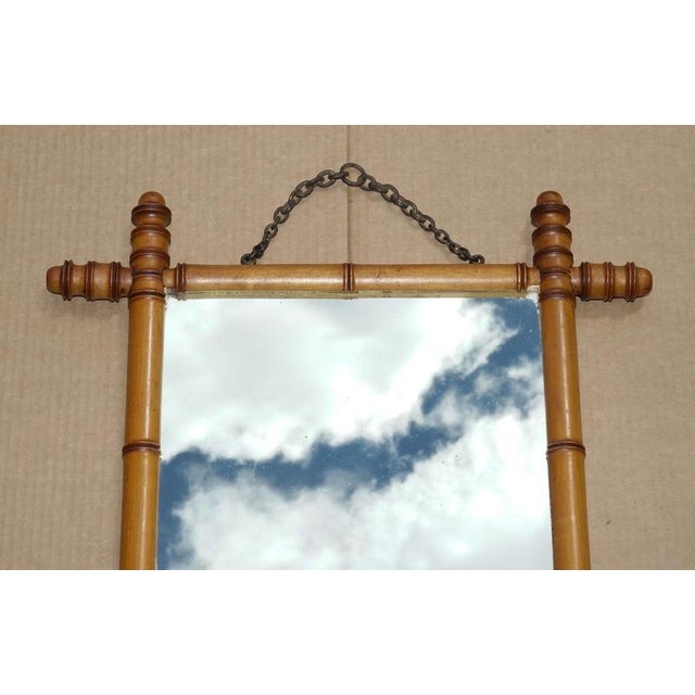 Antique English Decorative Faux Bamboo Wall Mirror A charming antique English decorative wall mirror, beautifully designed...