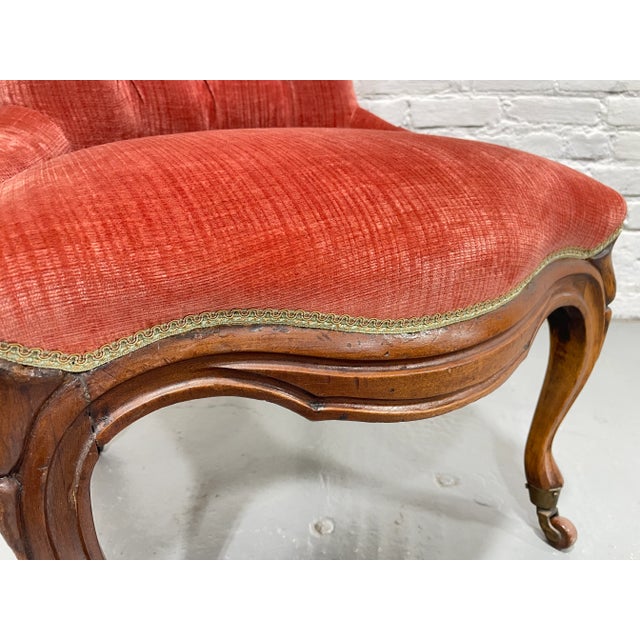 Victorian Tufted Slipper Chair | Pink Velvet Upholstery | Antique Accent Chair on Brass Casters, C. 1900's For Sale In New York - Image 6 of 12