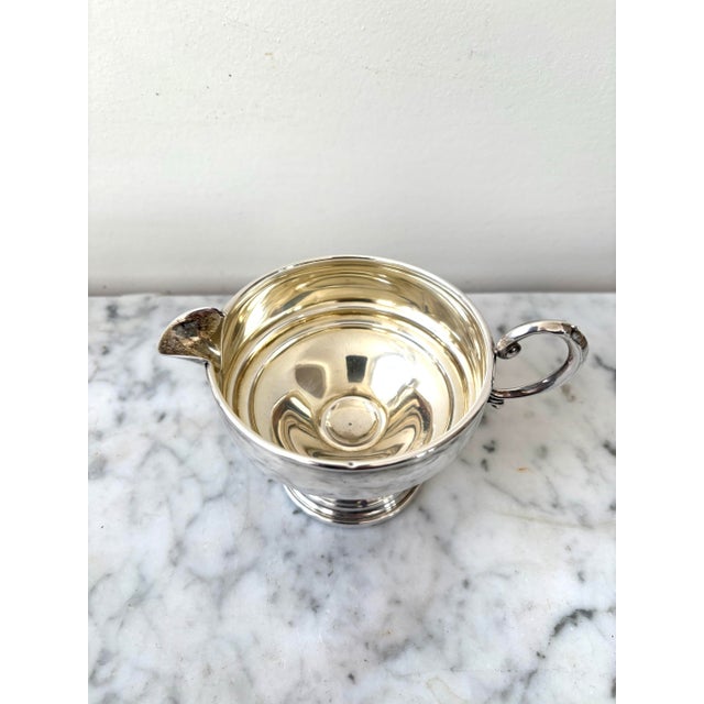 Vintage Revere Silversmiths Sterling Silver Creamer. Weighted base.