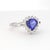 Metal 18k White Gold Ring With Trillion-Cut Tanzanite & Diamond Halo, New, Size 7 For Sale - Image 7 of 12