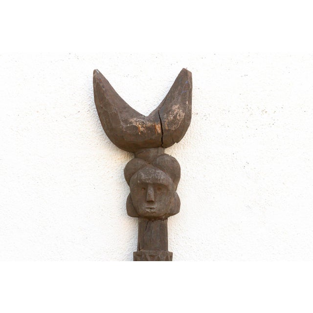 This commanding 75-inch ritual pillar is an authentic post from the Lobi people of Burkina Faso. Known as kothina, these...