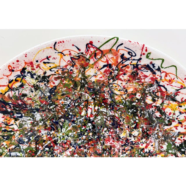 Artist made round decorative ceramic bowl painted in the style of Jackson Pollack. Large multi color hand painted bowl has...