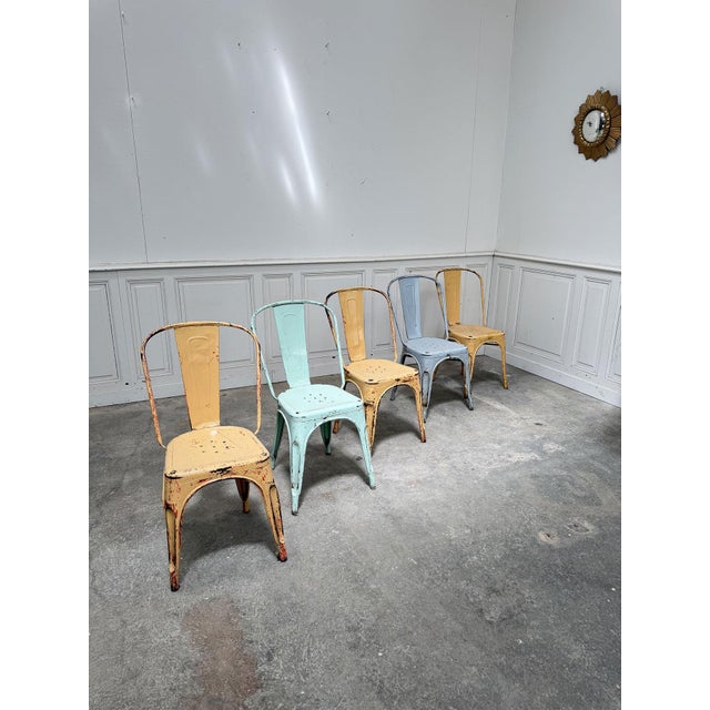 Five vintage Tolix Model A chairs dating from the 1960s in excellent condition. Iconic, Tolix chairs are equally at home...