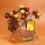 This is a vibrant and intricately crafted sculpture depicting a peach tree, rendered in a traditional Liuli (pate de...