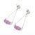 This is part of Chairish’s Fine Jewelry assortment. Modern Pink Sapphire Diamond Dangle Earrings in 18K gold to make a...