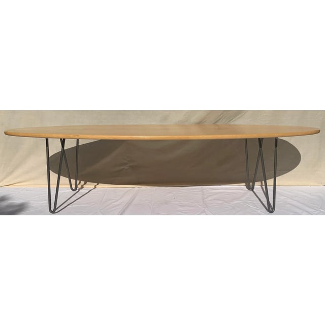 Transform your living room into a coastal paradise with this vintage surfboard coffee table. With reclaimed wood and steel...