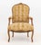 Louis XV Style Leopard Print Upholstered Walnut Fauteuil, the cresting carved with floral rosettes. 39.5" H x 25.5" W x...
