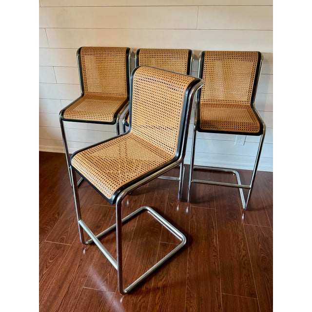A rare set of four Cesca bar stools in cane and chrome, circa 1970s. Attributed to Marcel Breuer for Knoll, though the...