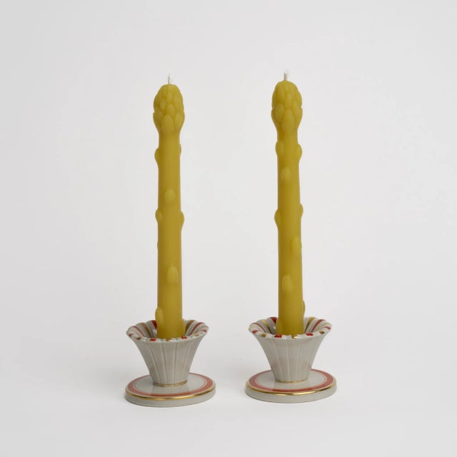 Whimsical yet elegant, these hand-poured asparagus taper candles are crafted from 100% natural unscented beeswax with...