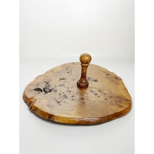 French wooden tabletop cheese tray dating from the 1960s. Crafted from a thick section of solid wood, the piece retains a...