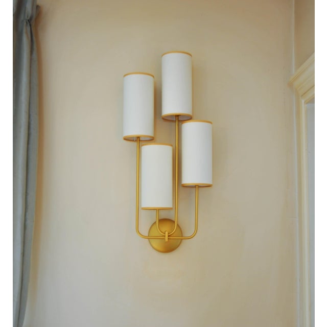 This wall sconce is handcrafted in our Parisian workshop and is part of our new collection. The metal frame has a gold...
