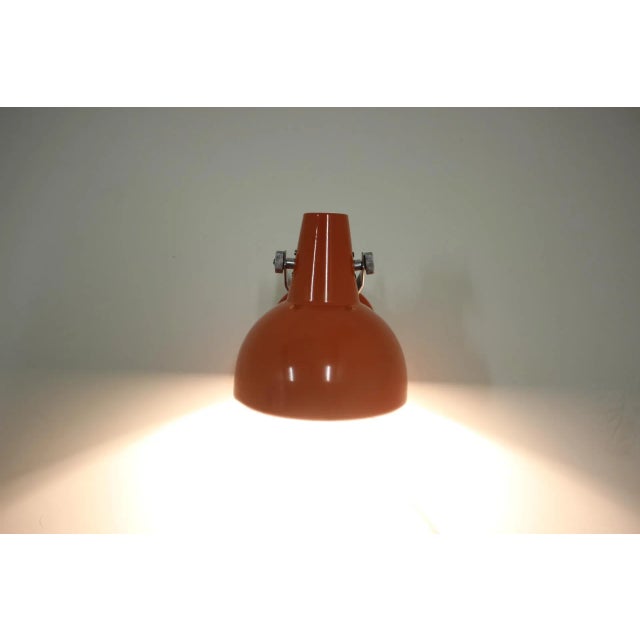 Vintage Orange Sconce, 1960s, in Good conditions. Designed 1960 to 1969 European Plug (up to 250V).The wiring of this item...